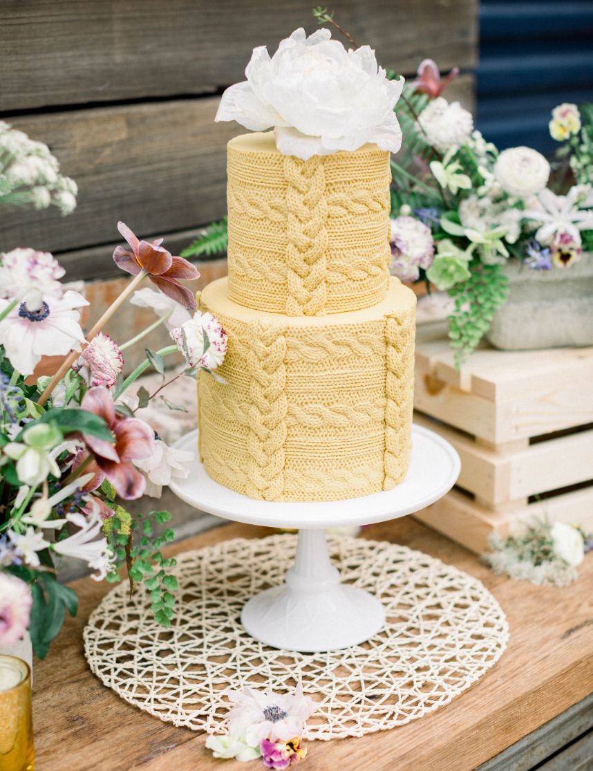 yellow sweater icing wedding cake