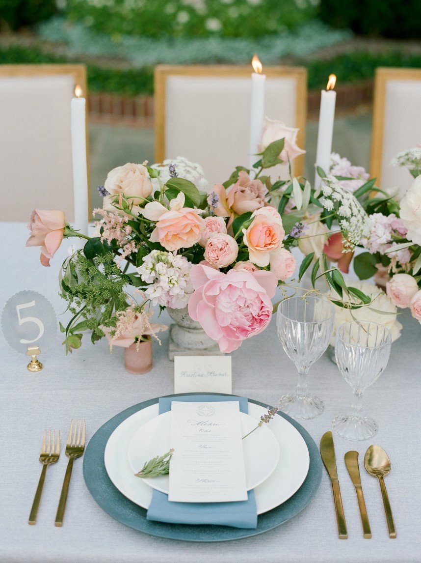 french country wedding vignette showing how guest count can affect wedding budget