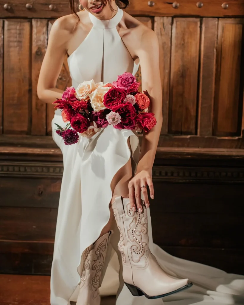 We are head over boots for this Martina Liana gown from brickhousebridal_bhb⁠ . ❤️ This sophisticated high-neck and dramatic cutouts