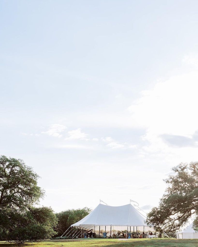 Nothing says "affair to remember" like a tented reception. Tents come in all shapes and sizes but this peak-topped white