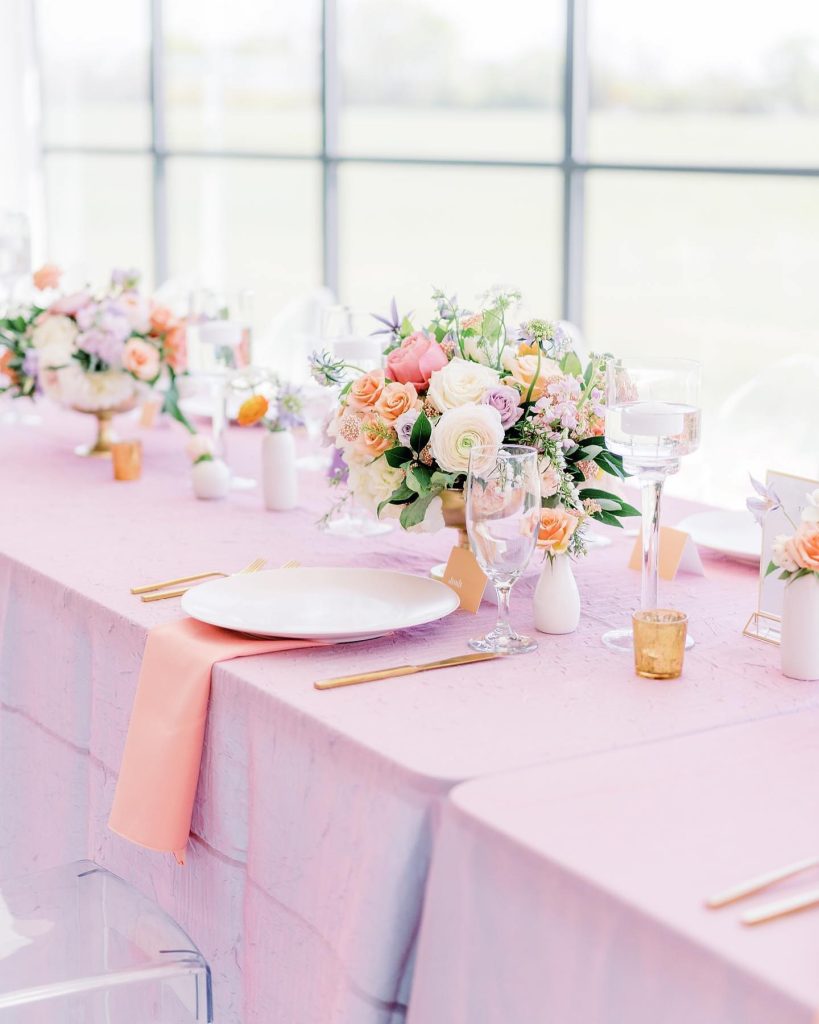 Pastel wedding inspiration is always at the forefront of our minds and this floral-filled reception space has Texas sunset shades