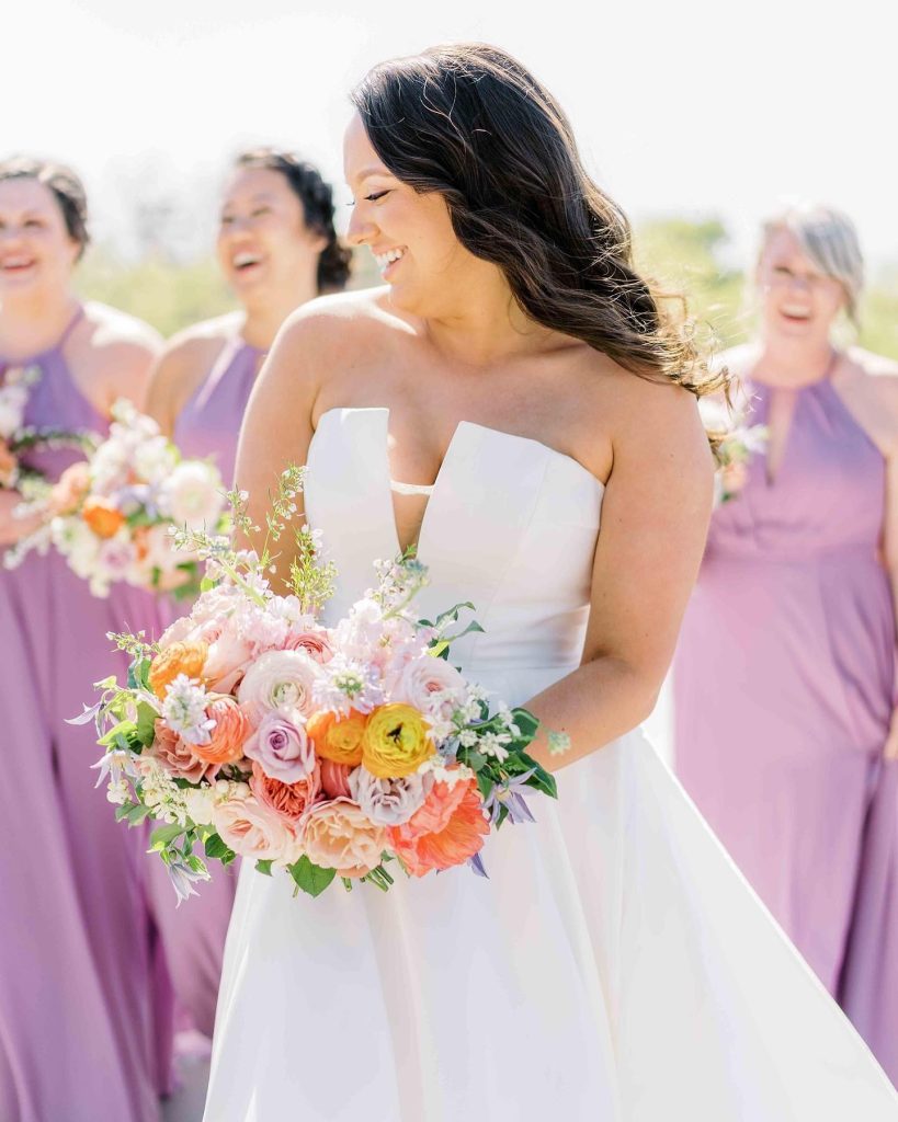 We are crushing on this whimsical spring wedding captured by aliciayarrish where a burst of color perfectly accented the light