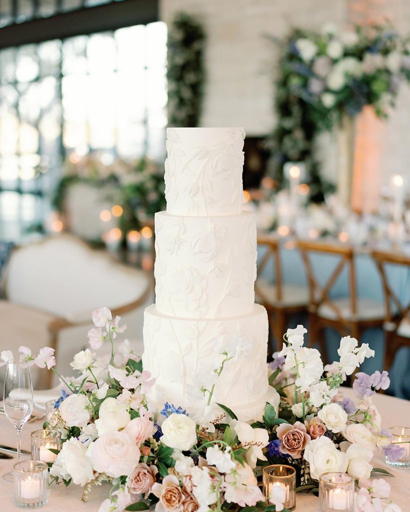 Sweet moments and sweet treats at Kirsten & Colby’s wedding! Their day was complete with a fabulous three-tiered cake from